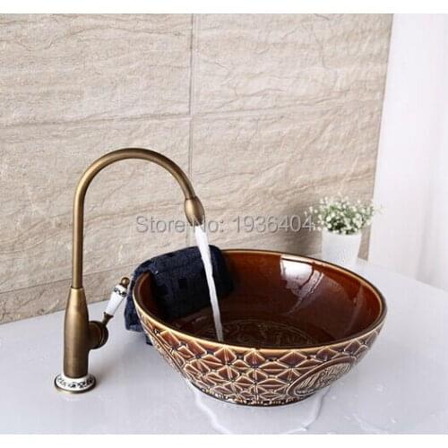 2015 Newly Retro Antique Brass Finished faucet Swivel Mixer Taps Deck Mounted with porcelain torneira banheiro AF1074
