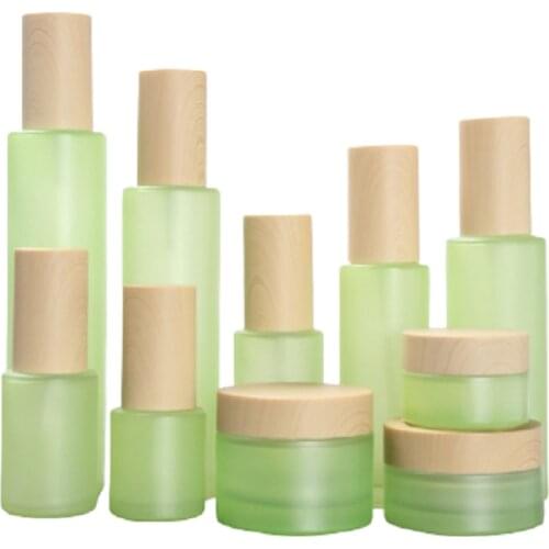 20ml 30ml 40ml 60ml 80ml 100ml Empty Frost Green Glass Bottle WhiteToner Spray Lotion Pump Wood Plastic Lid 20G 30G 50G Jar 8pcs
