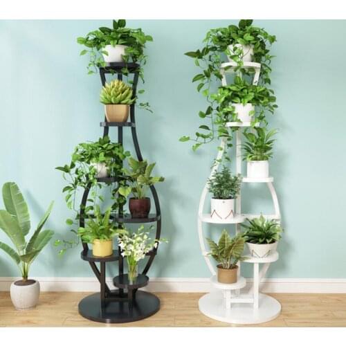 The living room household use pattern rack multilayer indoor special price balcony iron work circular buy content rack adornment