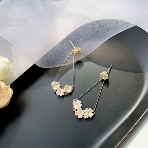 Temperament net red earrings earrings Female Minority design feeling long earrings chrysanthemum Earrings