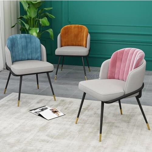 Light luxury high-end dining chair soft bag cushion backrest simple iron chair home modern makeup Italian minimalist stool
