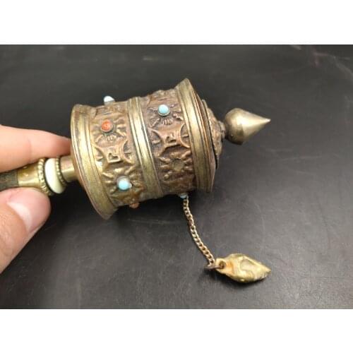 Tibetan hand spinning sutra wheel relief spiritual mascot, magic arts