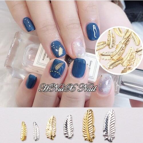 100 pcs Beauty Nail Art Decoration Gold Silver Feather 3D Metal Accessories Stylism Nail Design Tools