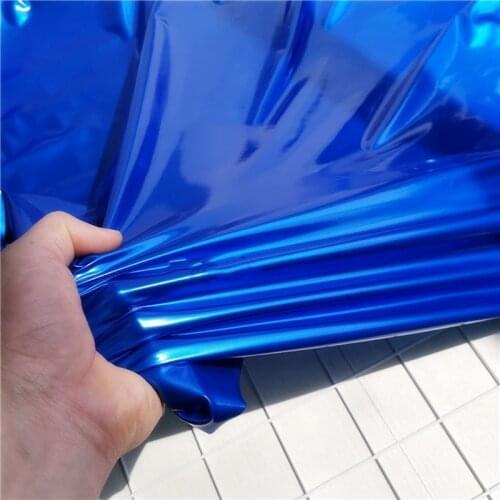 140cm*100cm Royal blue high-stretch knitted leather fabric four-sided elastic bright smooth mirror PU leather garment fabric