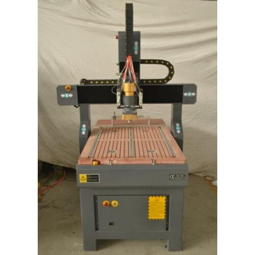 New designed 6090 3d ATC wood cnc router with 2.2kw water cooled auto tool changer spindle