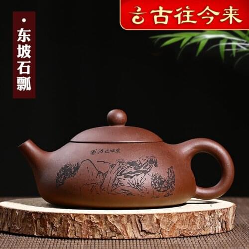 Yixing ores are recommended by the pure handmade gifts home teapot tea set dongpo stone carved gourd ladle paint