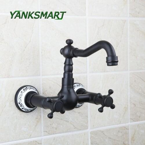 YANKSMART Bathtub Wall Mounted Oil Rubbed Black Bronze Swivel dual handles Bathroom Basin Sink Faucet Mixer Tap ceramic base