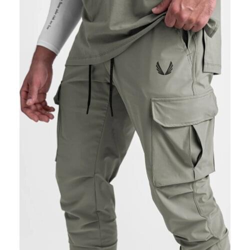 2021 new sports pants mens fitness pants Multi Pocket overalls quick drying elastic Leggings running training pants