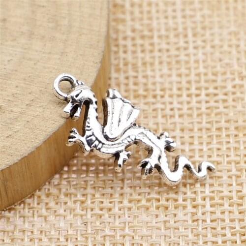 Free shipping 50pcs 27x11mm antique silver Flying dragon charms diy retro jewelry fit Earring keychain hair card pendant