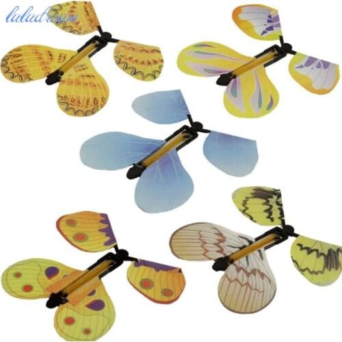 5pcs/lot butterfly Magic Fairy Flying in the Book Butterfly Rubber Band Powered Wind Up Butterfly Toy Great Surprise