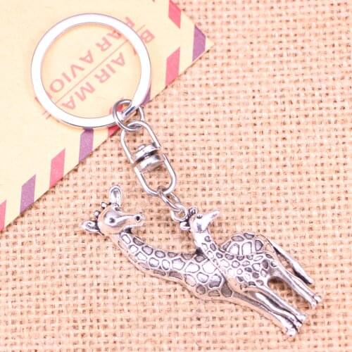 20pcs New Fashion Keychain 54x22mm giraffe deer Pendants DIY Men Jewelry Car Key Chain Ring Holder Souvenir For Gift