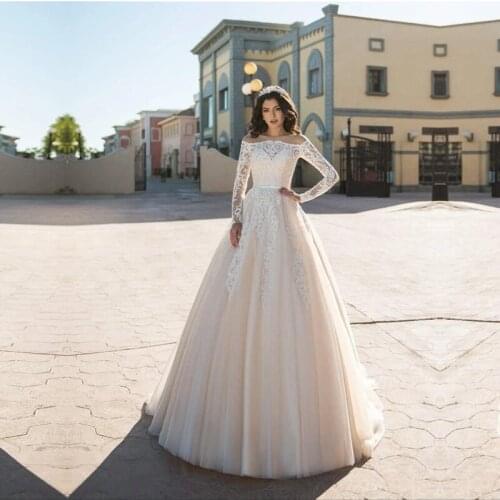 Attractive Tulle Off the Shoulder See-through Bodice A-line Wedding Dress 2020 Lace Appliques Beadings Long Sleeves Bridal Dress