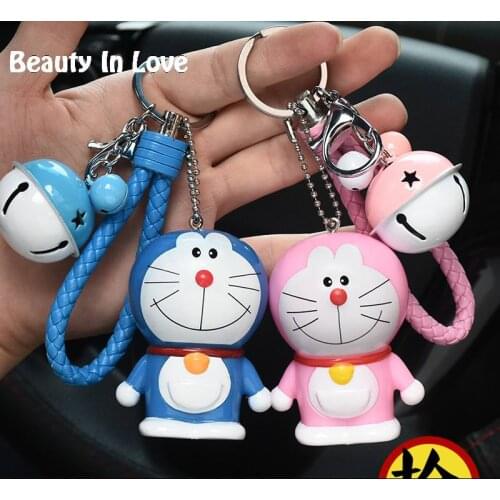 Cute Cartoon Doraemon Girl Toys Fur Ball PomPom Pom poms Keychain Women Leather Strap Metal Key Ring Chains Car Bag Charm D33