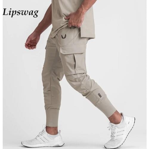 Summer Sports Elastic Jogging Trousers Casual Men Fashion Slim Pencil Pants Mens Drawstring Pockets Track Pants 2021 Streetwear