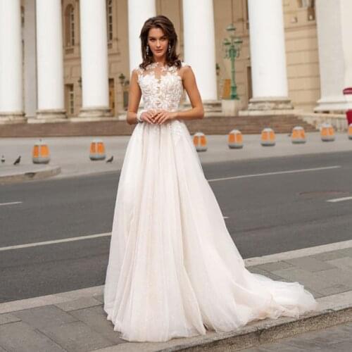 O-Neck Sleeveless Beads Lace Appliques Pearls Buttons Tulle A-Line Wedding Dress 2021 Vestido De Noiva Bridal Gown