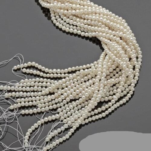NATURAL CULTURED FRESHWATER PEARL POTATO 4x5mm BEADS 15" STRAND