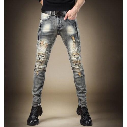 Free Shipping New mens male denim pants jeans spring tide brand slim feet pants Korean version stitching camouflage trousers