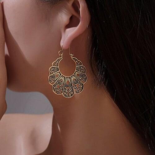 Bohemian retro fashion hot metal geometric pattern hollow multi-layer carved gold Colorethnic style ladies earrings