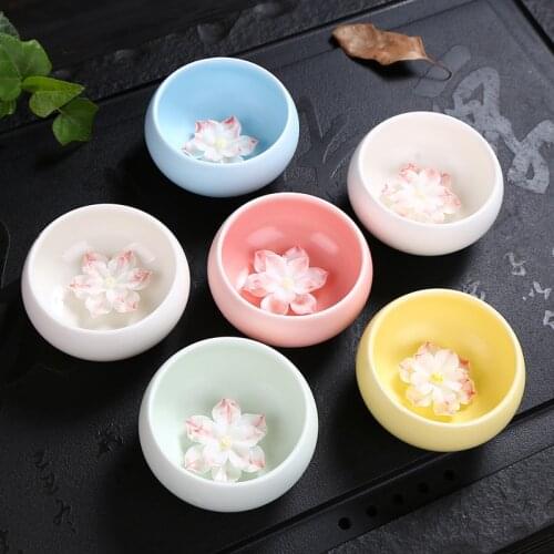 Dehua relief lotus single cup jade porcelain tea cup large white porcelain thin embryo master cup Pu 'er tea individual cup