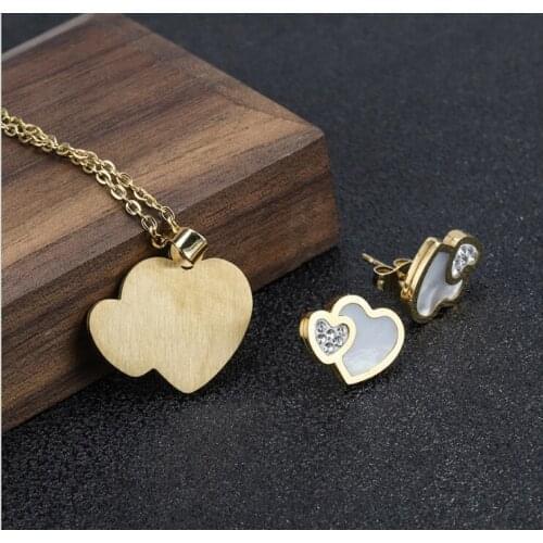 Double heart with Stainless steel and Shell necklace and earings exquisite two - piece set