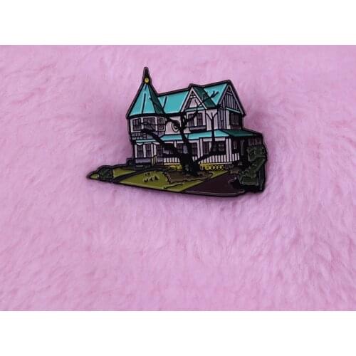 The Klopek House brooch pin