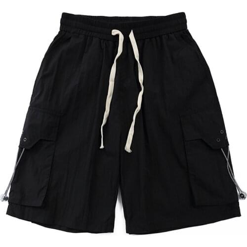 Summer 2021 New Japanese Style Mens Short Pants Streetwear Fashion Loose Fit Multi Pocket Drawstring Shorts Mens Capris Cargos