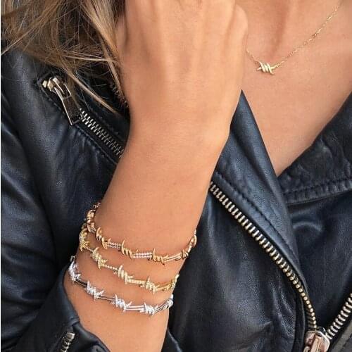 2021 HipHop Wire Cross Gold Plated Iced Out Bling Staggered Pattern Length X Knot Cubic Zirconia Chain Bangle Bracelet For Women
