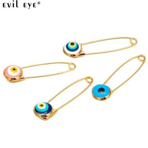 EVIL EYE Brooches