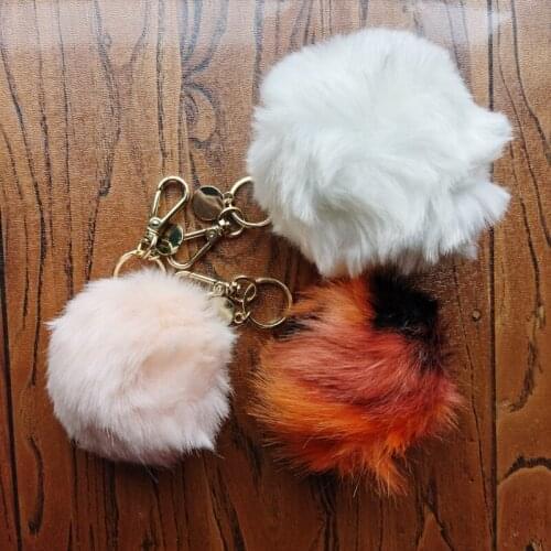 2021 New designer brand plush ball with golden keychains fluffy soft plush balls keyring furballs bag pendant decoration poms