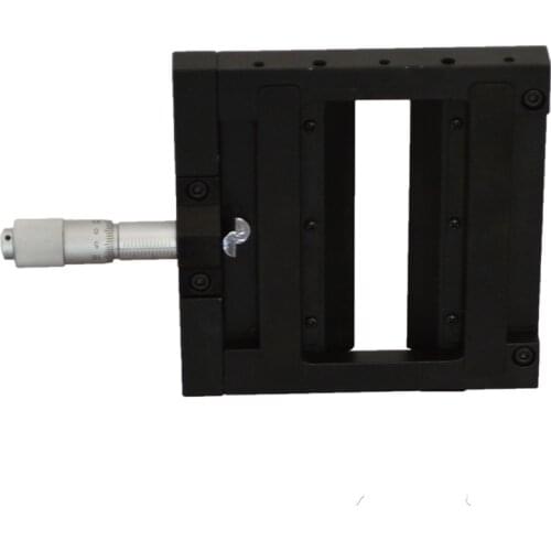 Optical manual single opening slit, differential head drive continuously adjustable single side slit width