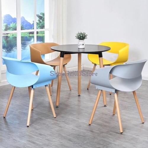 Nordic solid wood dining chair modern minimalist household plastic backrest stool designer creative negotiation ins net red chai