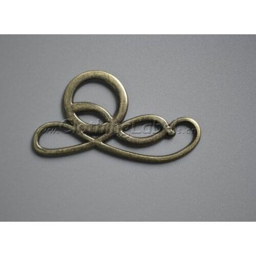 Custom irregular shape metal label for bag, clothing, shoes, zinc alloy material,irregular shape, hollowed out logo