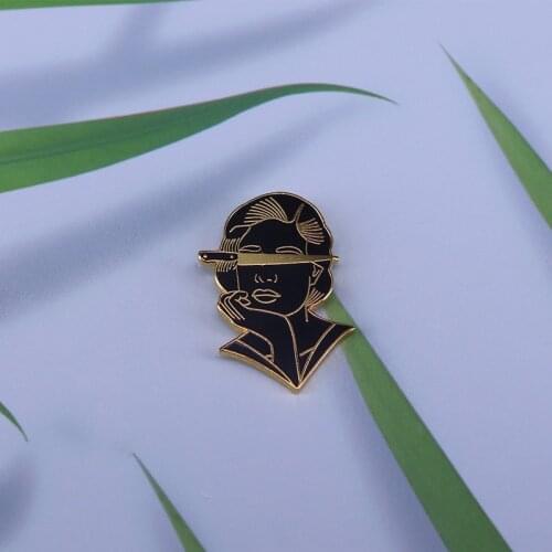 Young lady holds knife in face enamel pin