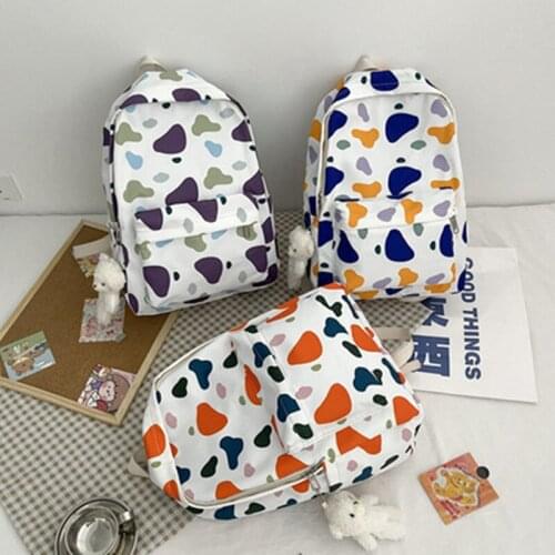 Cute camouflage girl backpack female Korean high school college student schoolbag female Harajuku contrast color backpack 2021