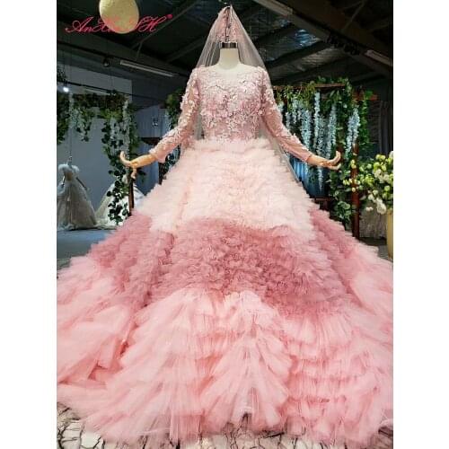 AnXin SH Luxury princess flower rose pink lace o neck beading crystal illusion dubai long sleeve wedding dress 100% real photo