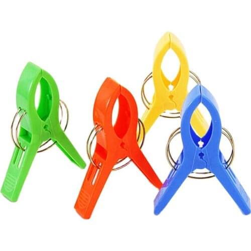 New 4pcs/set Clip lounger beach towel sun clothes sunbed peg pool cruiseship top 2019 Useful Clothes Pins