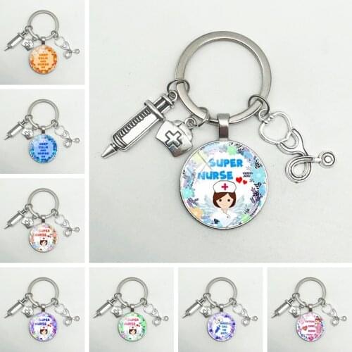Latest Home Stethoscope Nurse Syringe Picture Keychain 25mm Round Convex Glass Dome Pendant Men and Women Fashion Charm Keychain