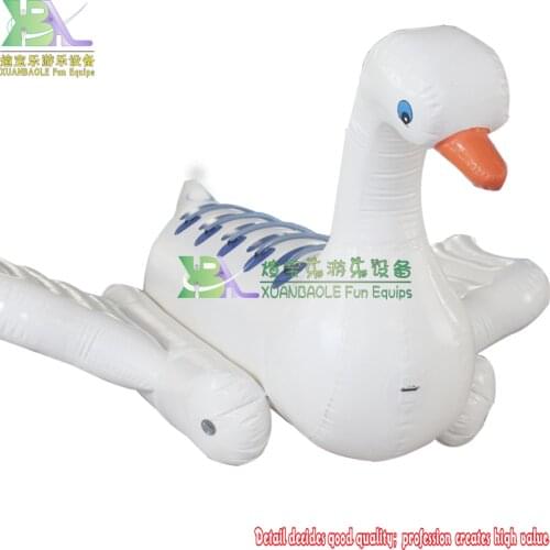 Factory From Guangzhou Wholesale PVC Inflatable Animal Floating Dog And Duck Boat For Adults N Kids