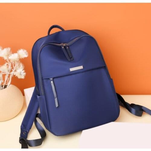 Korean Style Nylon Backpack Large Capacity Travel Bag For Junior High School Students Preppy Style Campus Solid Color Mens And