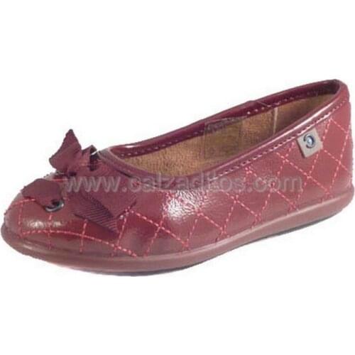 French flushed with burgundy stitching, of Conguitos