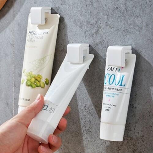 Bathroom Toothpaste Holder Hanger Adhesive Facial Cleanser Clip Multifunctional Toothpaste Storage Rack Bathroom Accessories