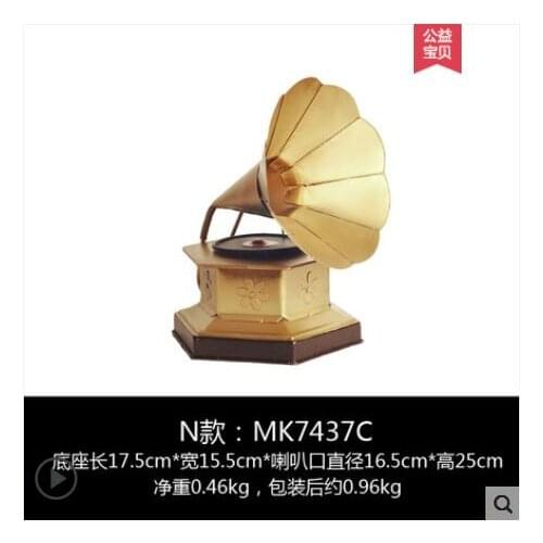 Cartoon statue vintage phonograph up the living room European TV cabinet with household decorations wine shop is decorated with