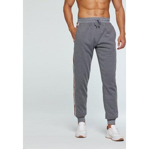 2019 Autumn and Winter New Casual Sports Pants Mens Contrast Color Vertical Strip Loose Tie Pants Waist Beam Feet Pants S-2XL