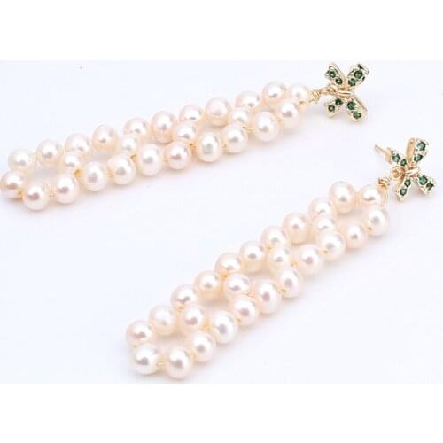The S925 silver needle allergy proofing exquisite handmade jewelry with true natural white freshwater pearl stud gold fillings