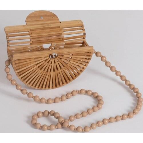 Fashion handmade bamboo bamboo root bracelet bamboo weaving hollow literary mini flip phone female bag