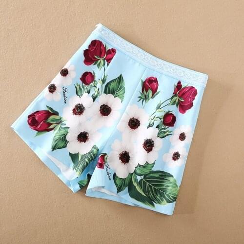 European and American womens wear for spring 2021 Fashion blue shorts with floral prints