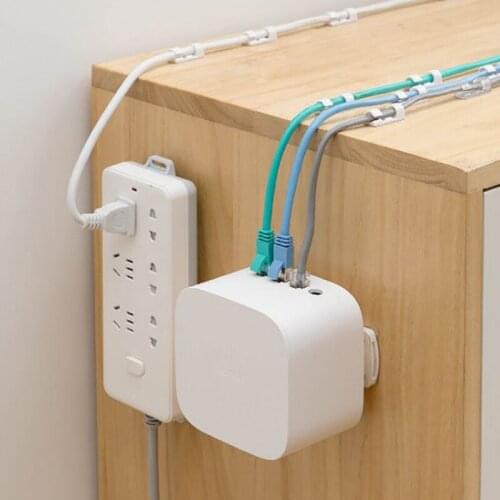 Power Strip Holder Desk Organiser wall-mounted Strong Seamless Home Free Punching Socket Hanging Wall Home Storage Supplies