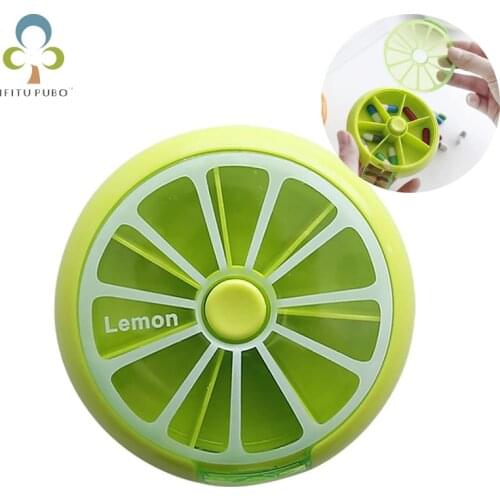 Creative fruit rotating travel pill box portable one week small PP sub-packing capsule medicine box three color optional YJN