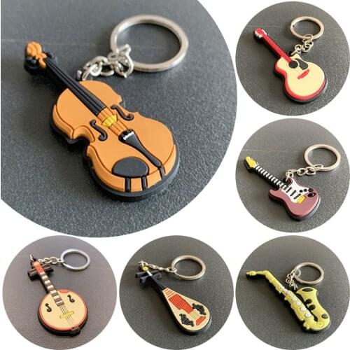 Hot Sale Musical Instrument Key Chain Cool Luxury Yukri Guitar Piano Violin Sax Man Women Music Keyring Pendant Accessories