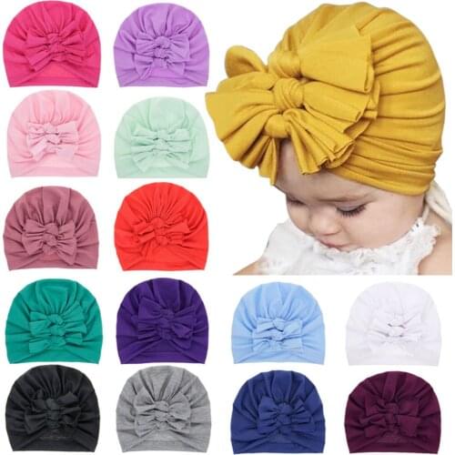 Lovely Soft Winter Newborn Cap Solid Color Cotton Thick Hat Fashion Bows Winter Warm Baby Hat Winter Hairball Cap